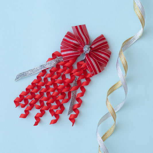 A pinwheel bow on alligator pins with danglers - Red, Silver