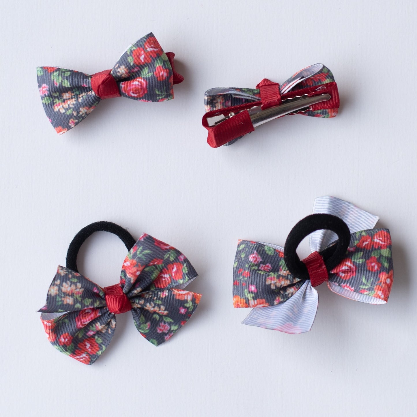 Combo: Floral print small bow on alligator clips and matching small rubberbands - Grey and Maroon.