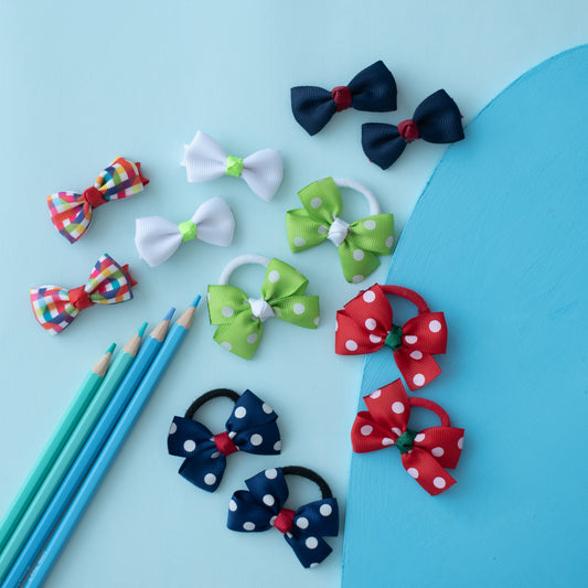 Combo: Colourful checkered bow alligator clips along with white and Navy blue alligator pins. 3 pairs dotted bow rubberbands - Red, Nevy blue, White, Green