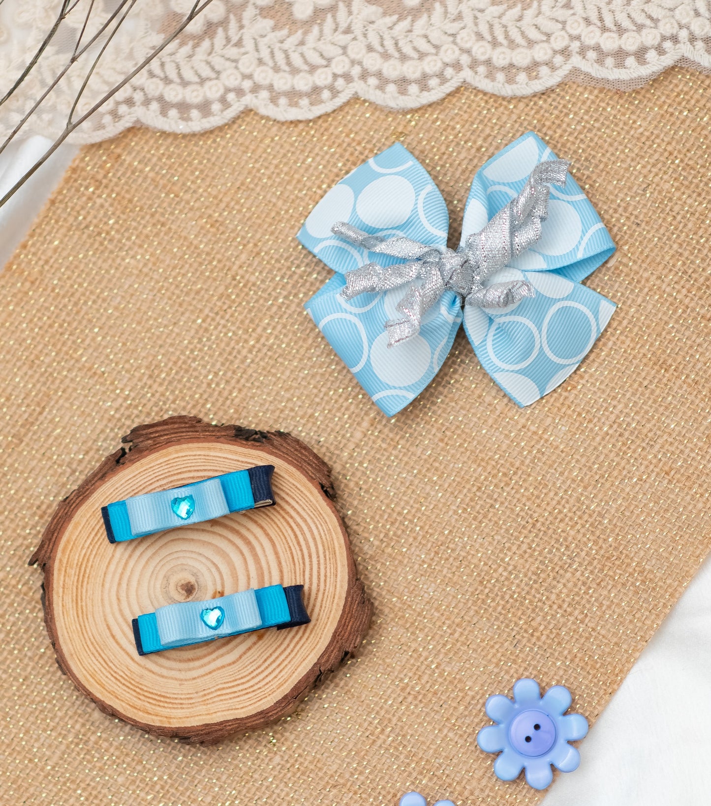 Big bow with curly ribbon on alligator pin along with pair of crystal embellished loopy bow on alligator pins- Blue