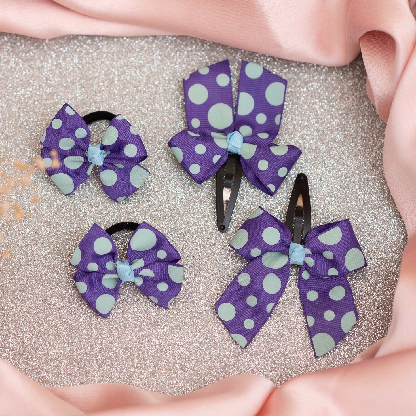 Combo: Polka dot bow on tic-tac pins and rubberbands- Purple and Blue