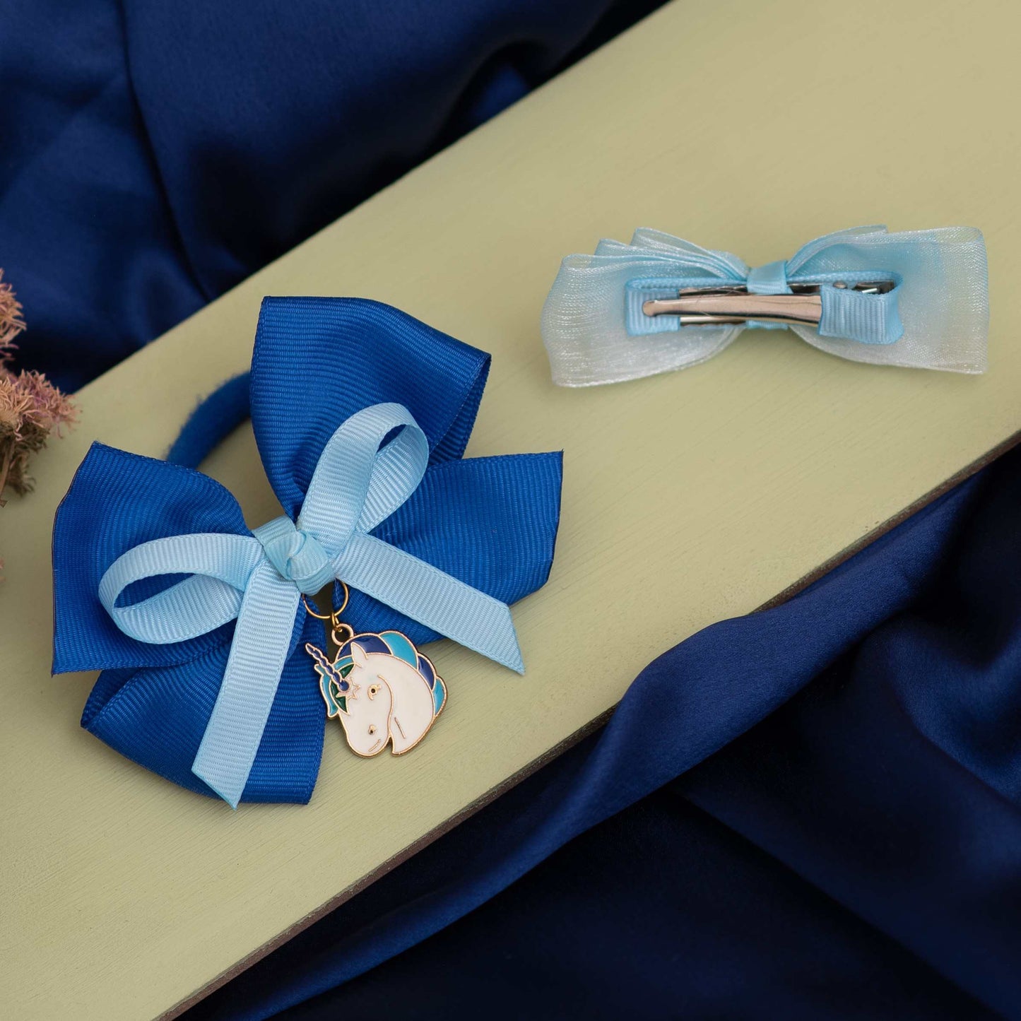 Combo: Adorable shaded loopy bow on alligator clip and dual bow rubberband with unicorn charm - Blue and White