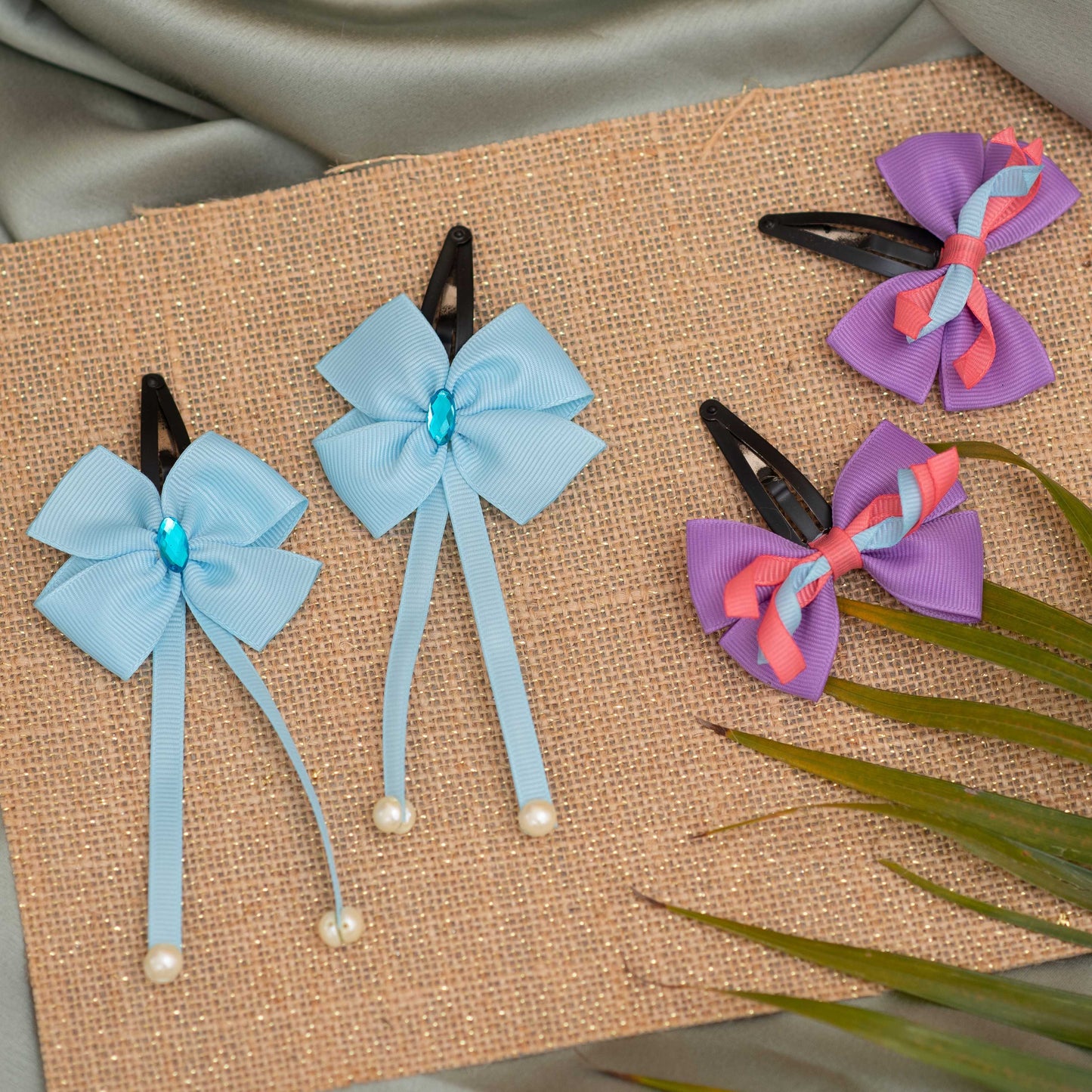 Combo: Set of 2 tic-tac combo,one of elegant danglers with pearls embellished and second one adorable bow with curly on tic-tac pins - Purple and Blue