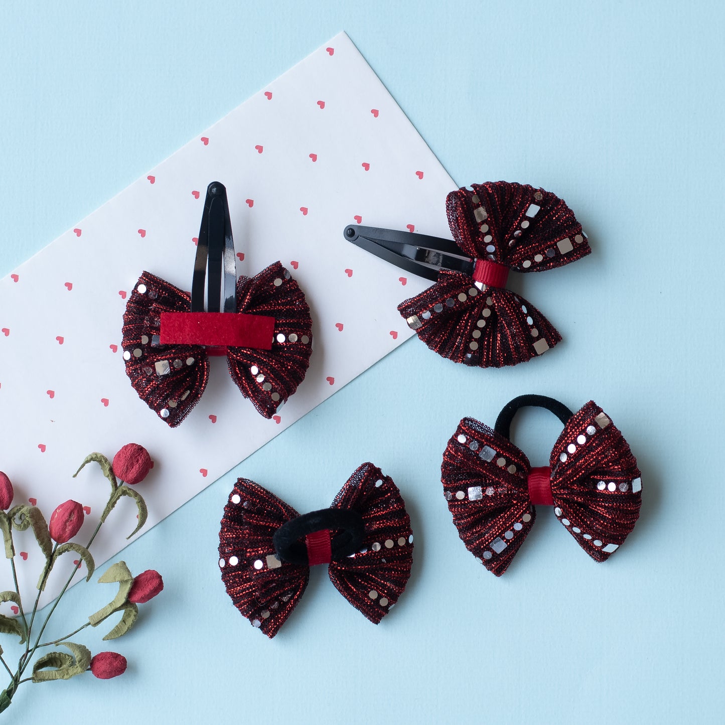 Combo : 1 Pair shiny bow tic-tac pins, and 1 pair matching bow rubberbands - Maroon