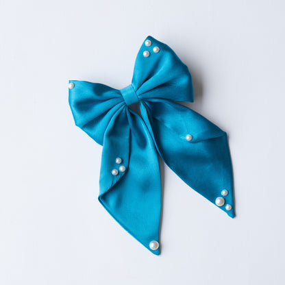 Big fancy satin bow on alligator clip embellished with pearls - Blue.