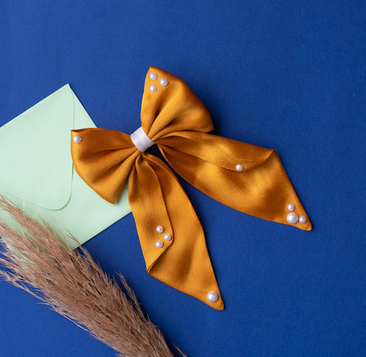 Big fancy satin bow on alligator clip embellished with pearls - Mustard Yellow