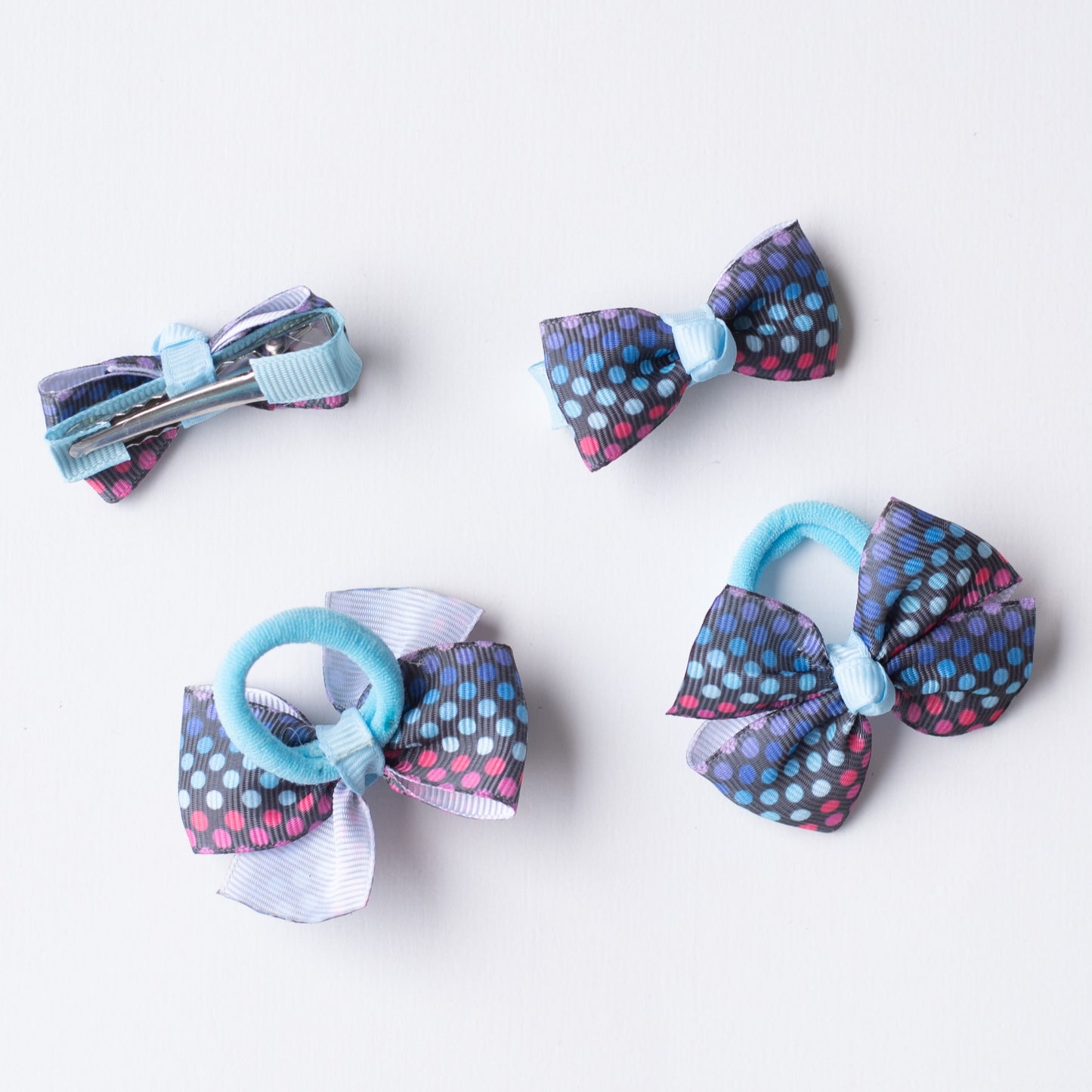 Combo: Polkadot print small bow on alligator cips and matching small rubberbands (4 nos) - Blue and Black.