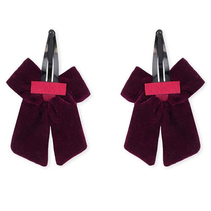 Elegant velvet bow on tic-tac pins with pearls - Magenta