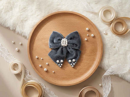 Velvet bow with pearl detailing on alligator clip - Grey