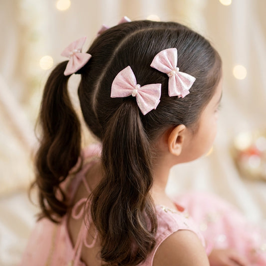 Shiny bow on alligator clips & rubberbands - Baby pink