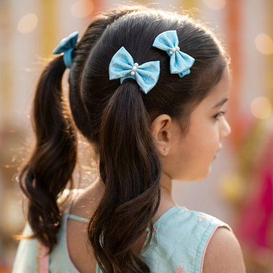 Shiny bow on alligator clips & rubberbands - Blue