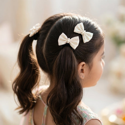 Shiny bow on alligator clips & rubberbands - White