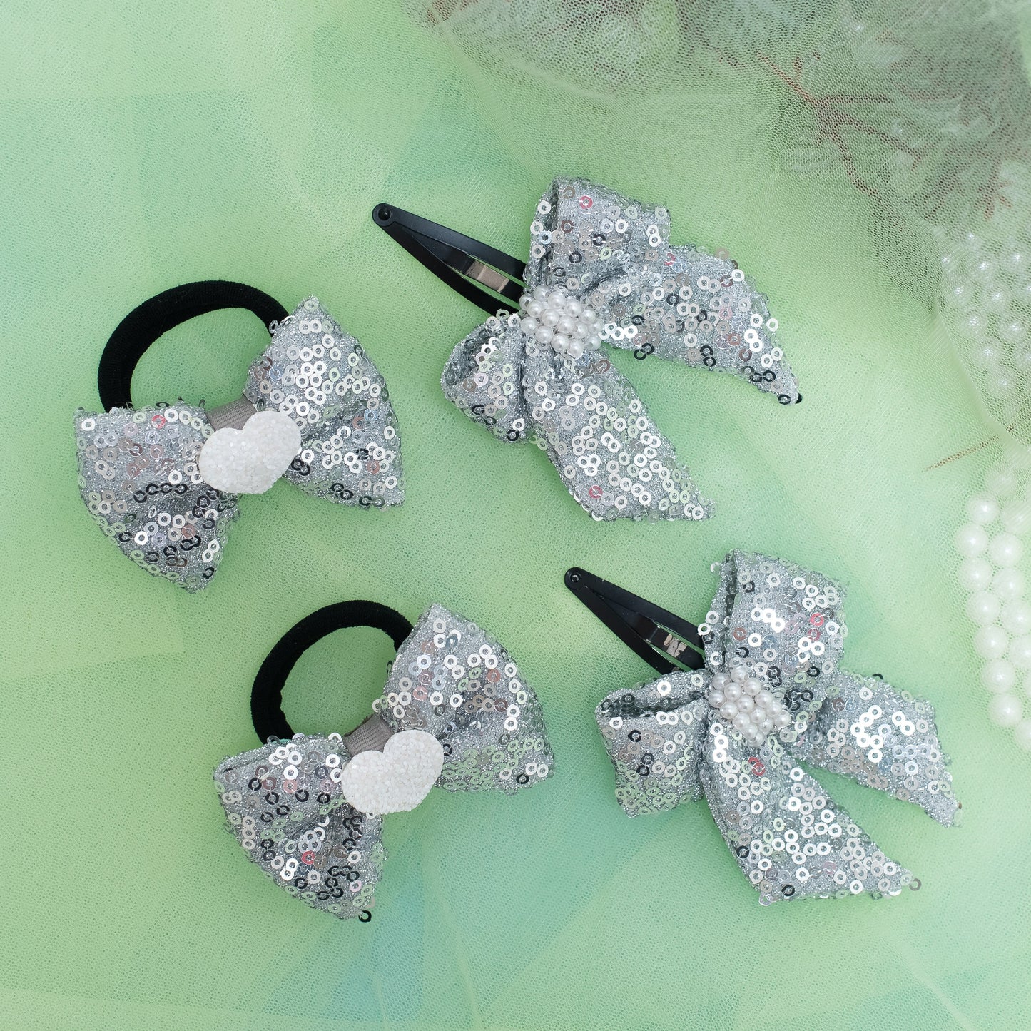 Combo: Sequined bow on Tic-Tac Pins and Rubberbands - Silver (Set of 1 pair Tic-tac clips and 1 pair Hair-ties = 4 quantity)