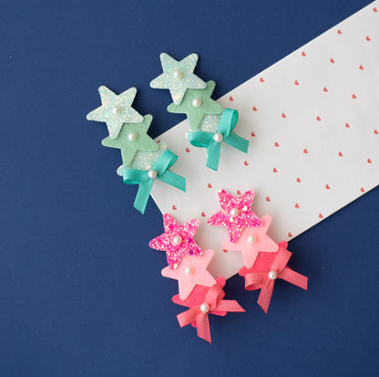 Combo :  Set of 2 cute glitter star alligator clips embellished with pearls and small bows  - Sea green , Pink