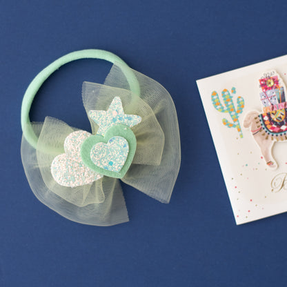 Soft net bow on super soft infant stretchy bands with glitter stars and heats - Sea green