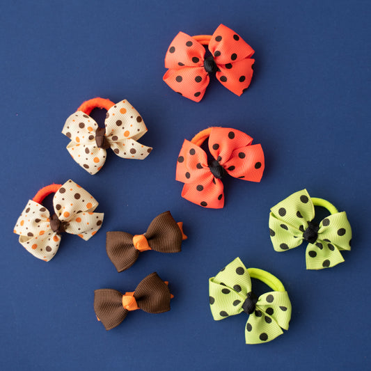 Combo:  One pair of aligator clips and 3 pairs of polka dotted rubberbands - Brown, Off White, Orange, Fluoroscent Green