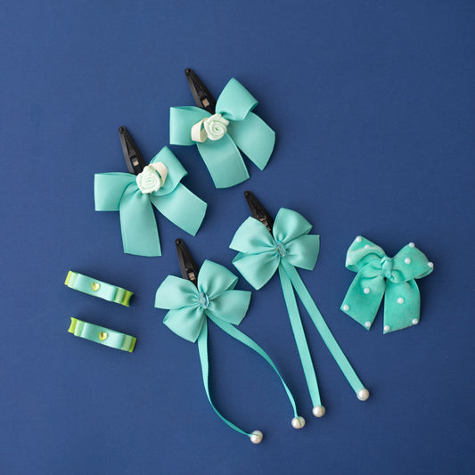 Combo: 1 pair dangling tic-tac clips, 1 pair small loopy alligator pins, 1 pair bow tic-tac clips embellished with roses, and 1 velvet bow on alligator clips - Sea green