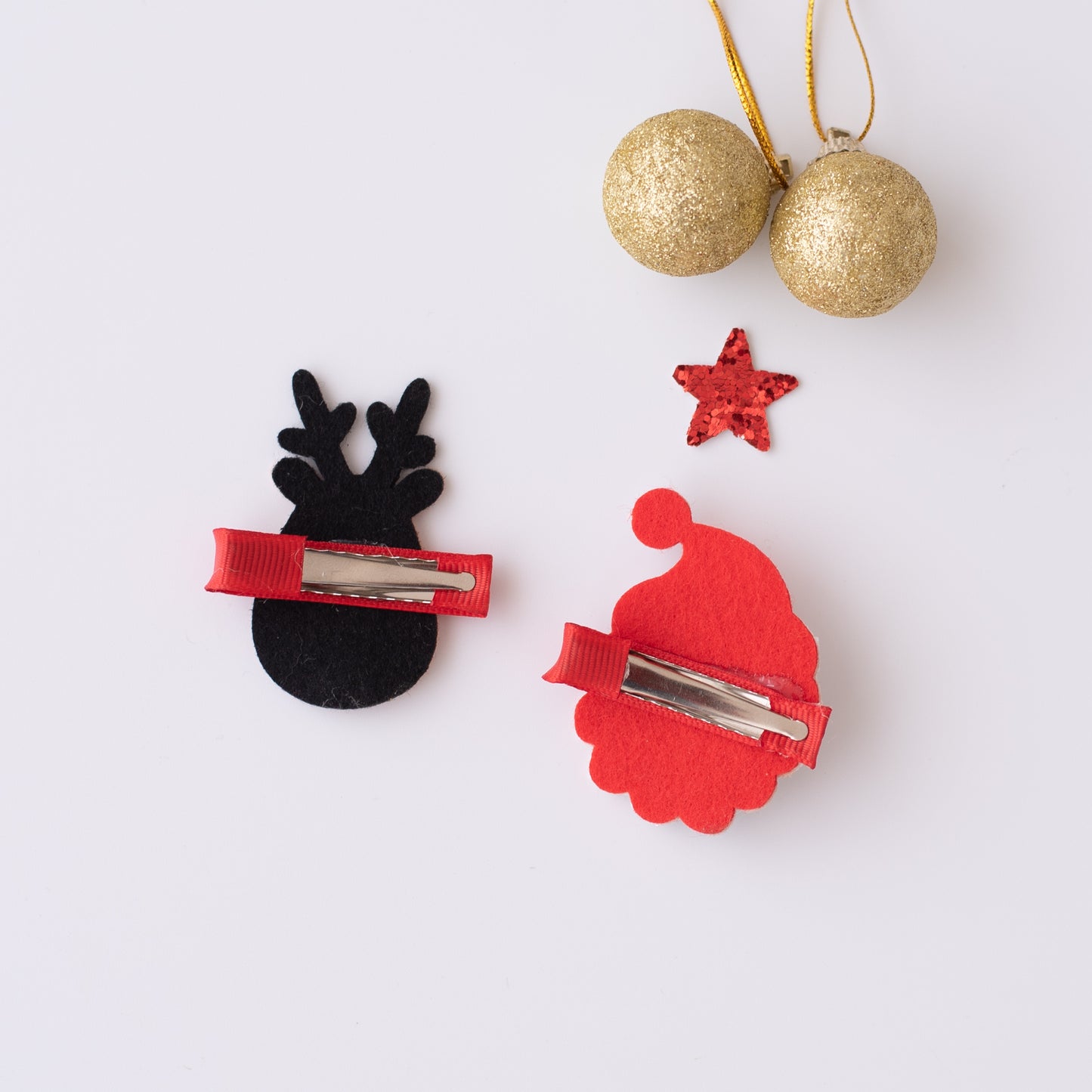Set of  2 cute alligator clips - 1 glitter santa claus and 1 reindeer with red nose. - White, Red, Brown