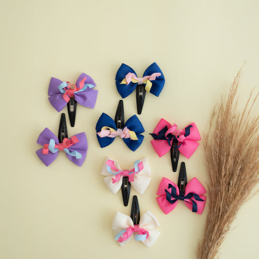 Combo: Set of 4 cute adorable bows with curly ribbons on tic-tac pins combo - Pink, Off white, Purple and  blue (Set of 4 pair - 8 quantity)