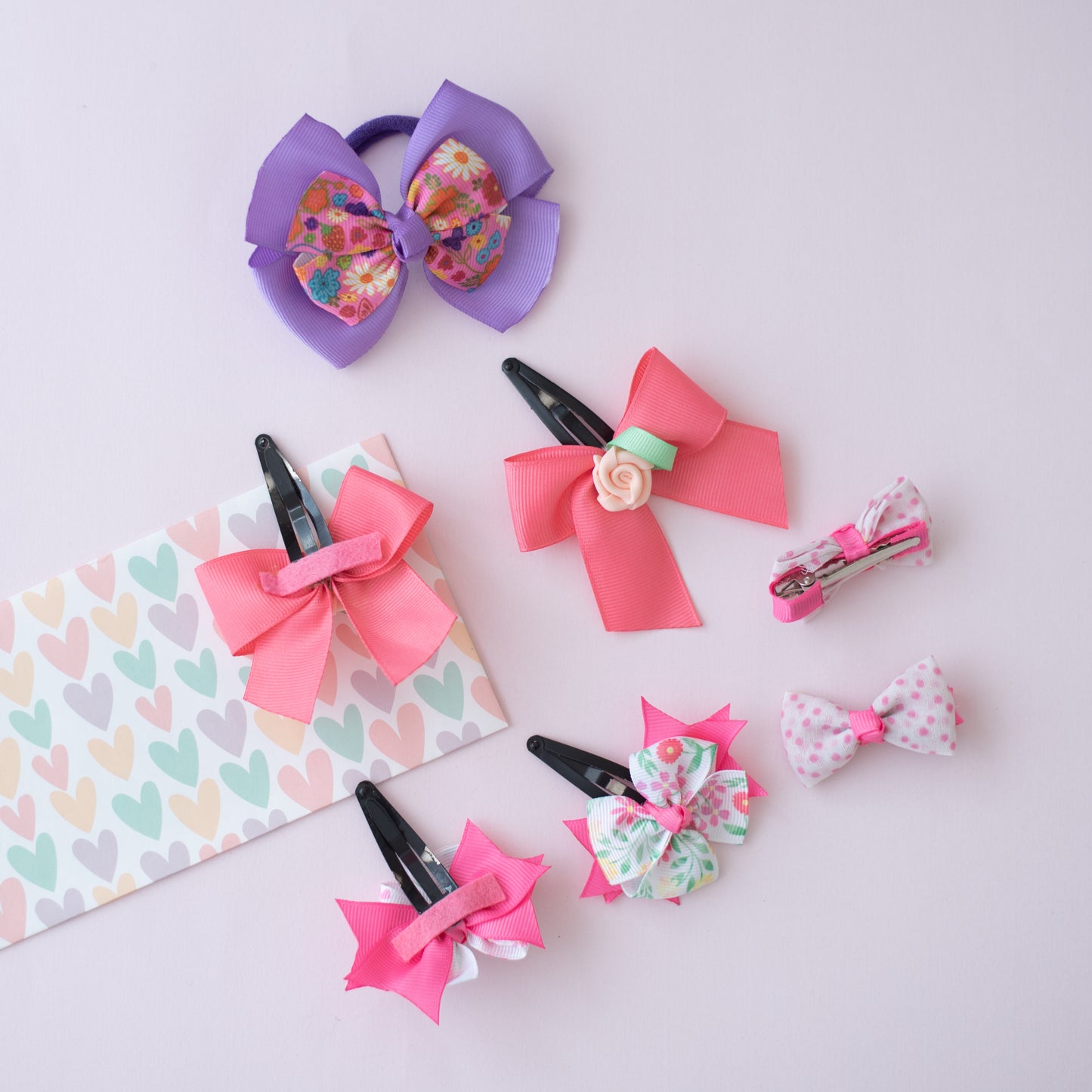 Combo: Cute double bow rubberband, peach dazzling rose embellished bow on tic-tac pins, pink and white double bow on  tic-tac clips and polka dotted alligator clips - Purple, Peach, White, Pink