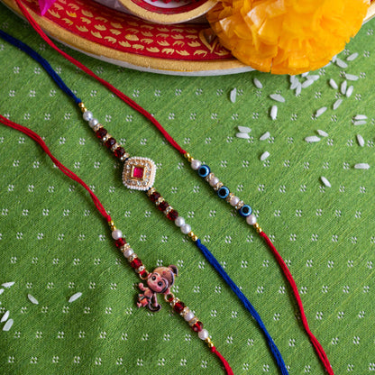 Set of 3 Rakhis, Little Hanuman, Evil Eye & Kundan Charm - Multicolor