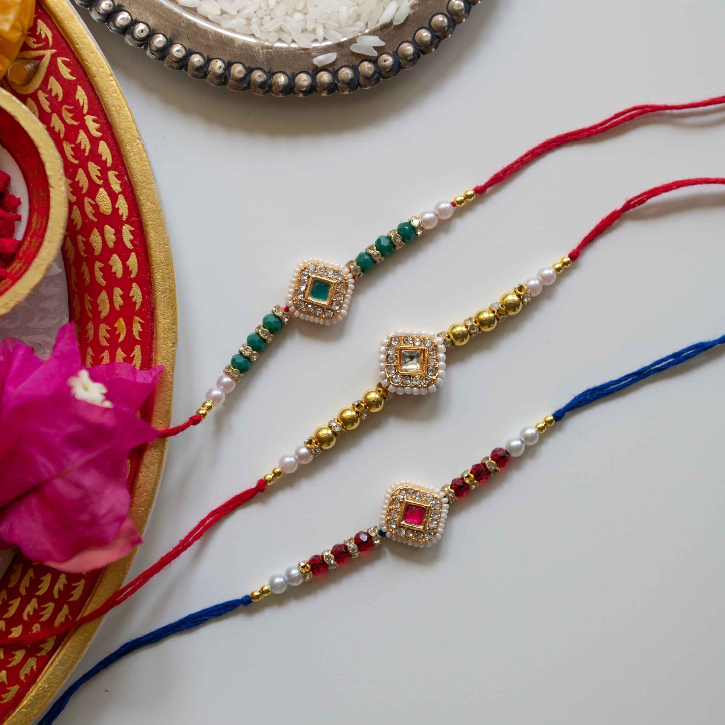 Ribbon Candy Set of 3 Rakhis-Handmade Kundan Charm- Pink, Green, Blue