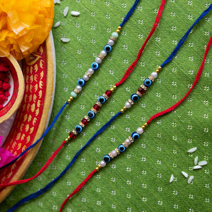 Ribbon Candy Set of 4 Rakhis-Handmade Evil Eye Beads- Blue, Red