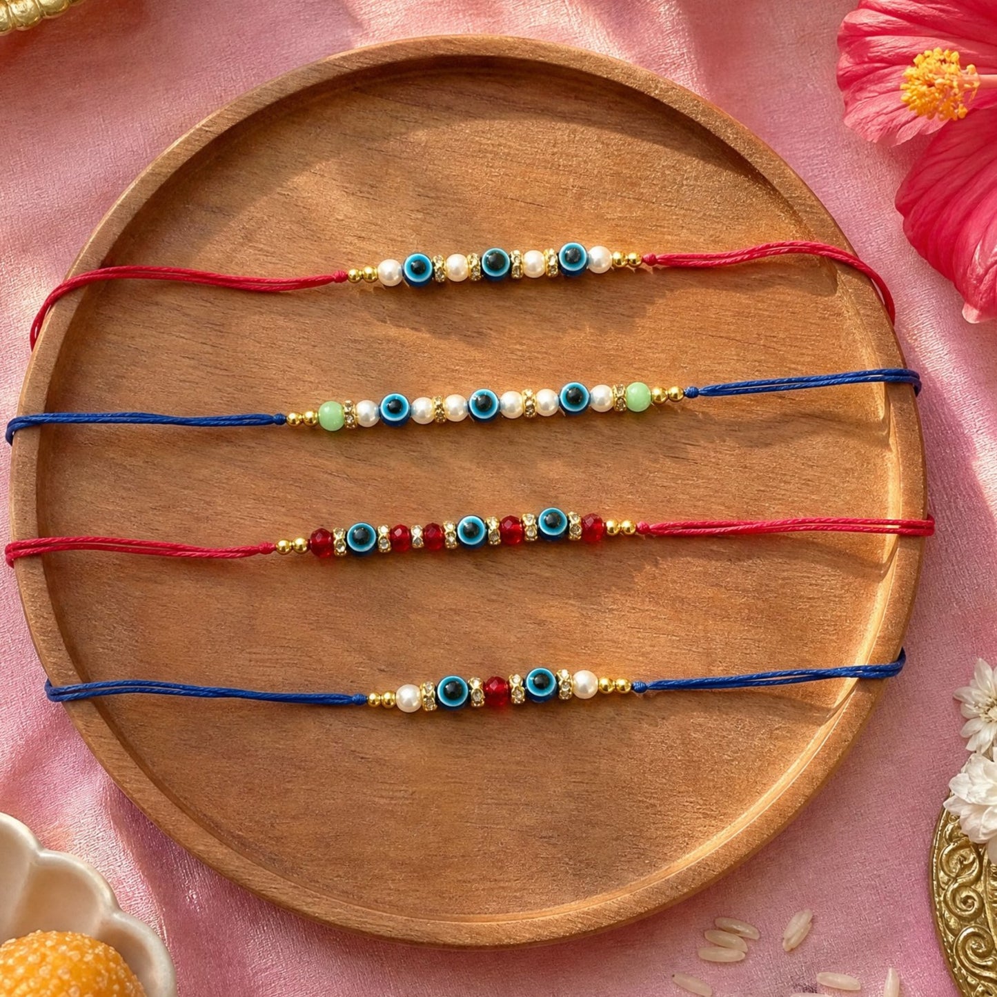Ribbon Candy Set of 4 Rakhis-Handmade Evil Eye Beads- Blue, Red