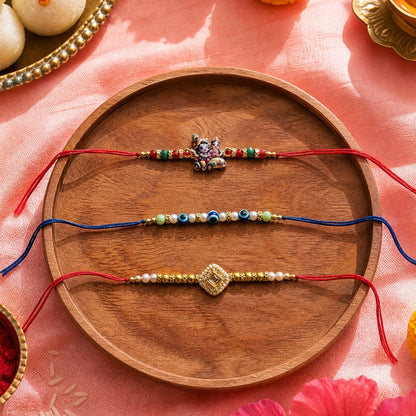 Ribbon Candy Set of 3 Rakhis-Radha Krishna, Kundan Charm and Evil Eye Beads - Multicolor