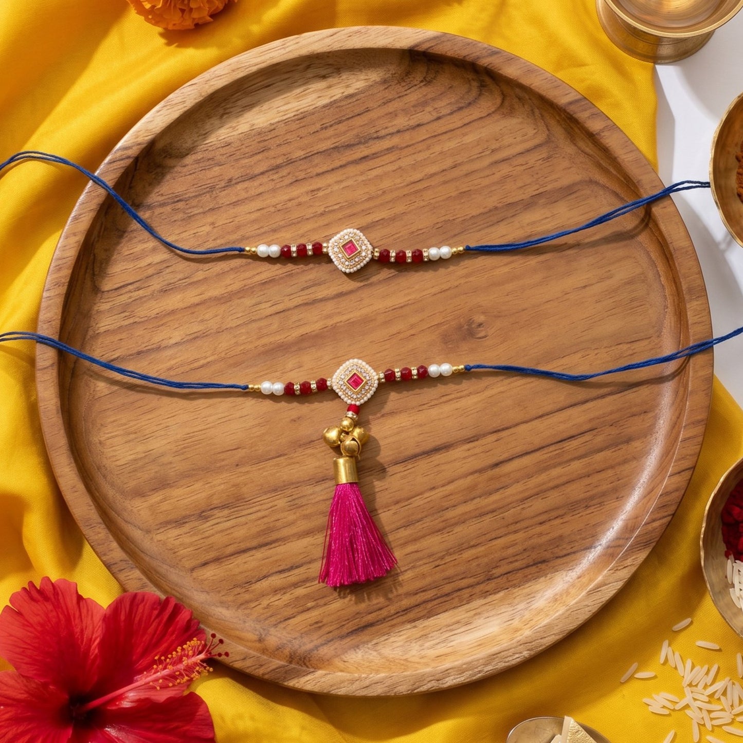 Ribbon Candy Set of 2 Rakhis-Bhai Bhabhi's kundan Charm B  - Pink, Blue