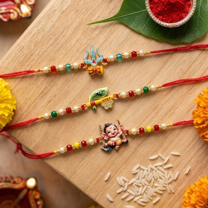 Ribbon Candy Set of 3 Rakhi-Handmade Lord Ganesha, Trishul and Peacock Feather Charms- Red