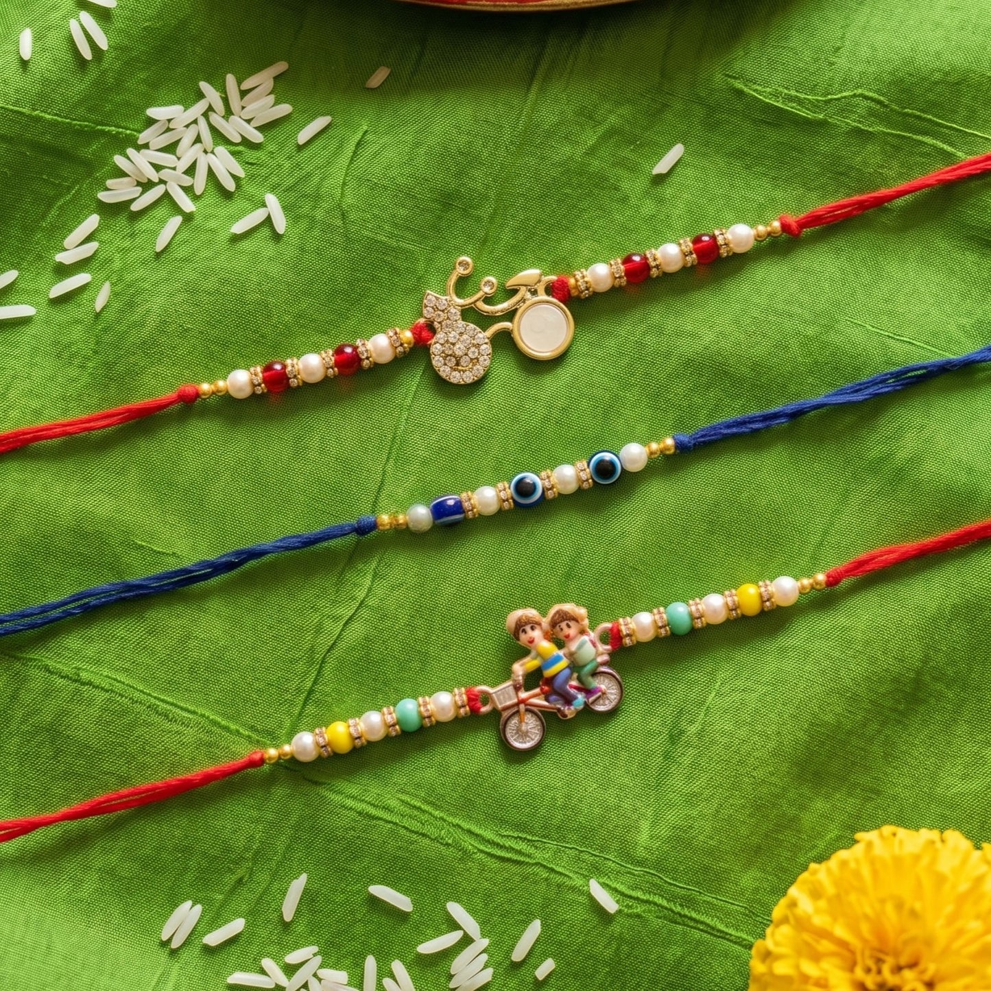 Ribbon Candy set of 3 Rakhi-Cartoon Charms and Evil Eye Beads- Blue, Red