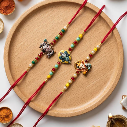 Ribbon Candy set of 3 Rakhi-Ganesha and Krishna Charms- Red