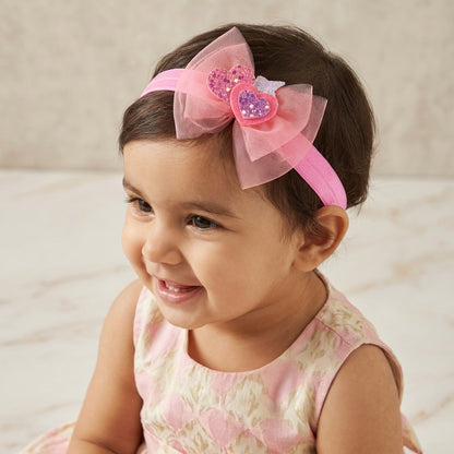 Soft net bow on super soft infant stretchy bands with glitter stars and heats - Pink