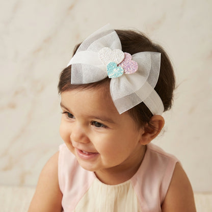 Soft net bow on super soft infant stretchy bands with glitter stars and heats - White
