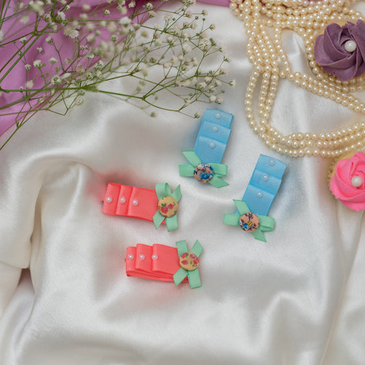 Unique layered bow with pearls and buttons adornments on alligator clips- Blue and Peach\