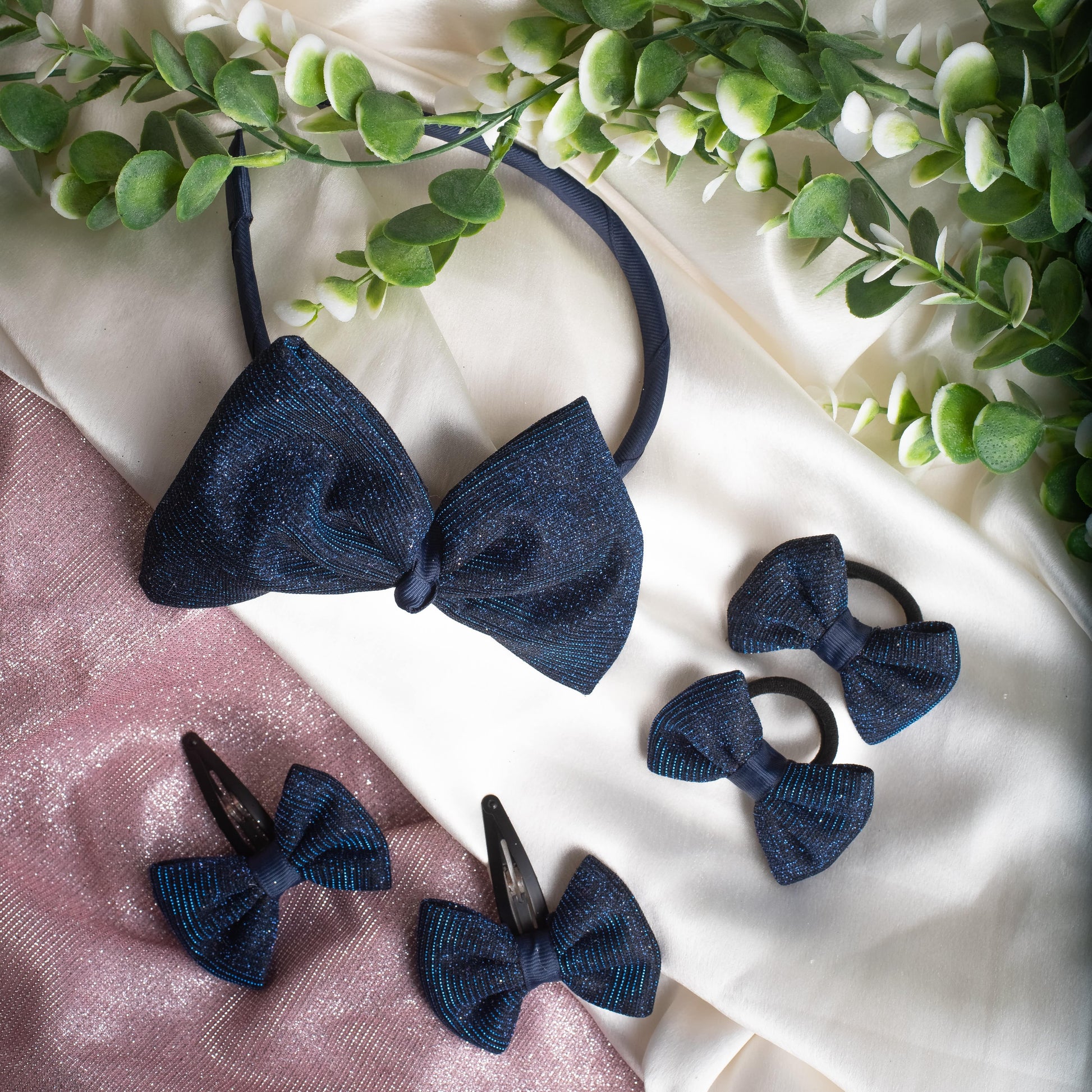 Ribbon Candy- Combo of 1 big bow shiny hairband, 1 pair of shiny bow tic-tac (2 nos), and 1 pair of shiny bow rubberband (2 nos)- Dark blue