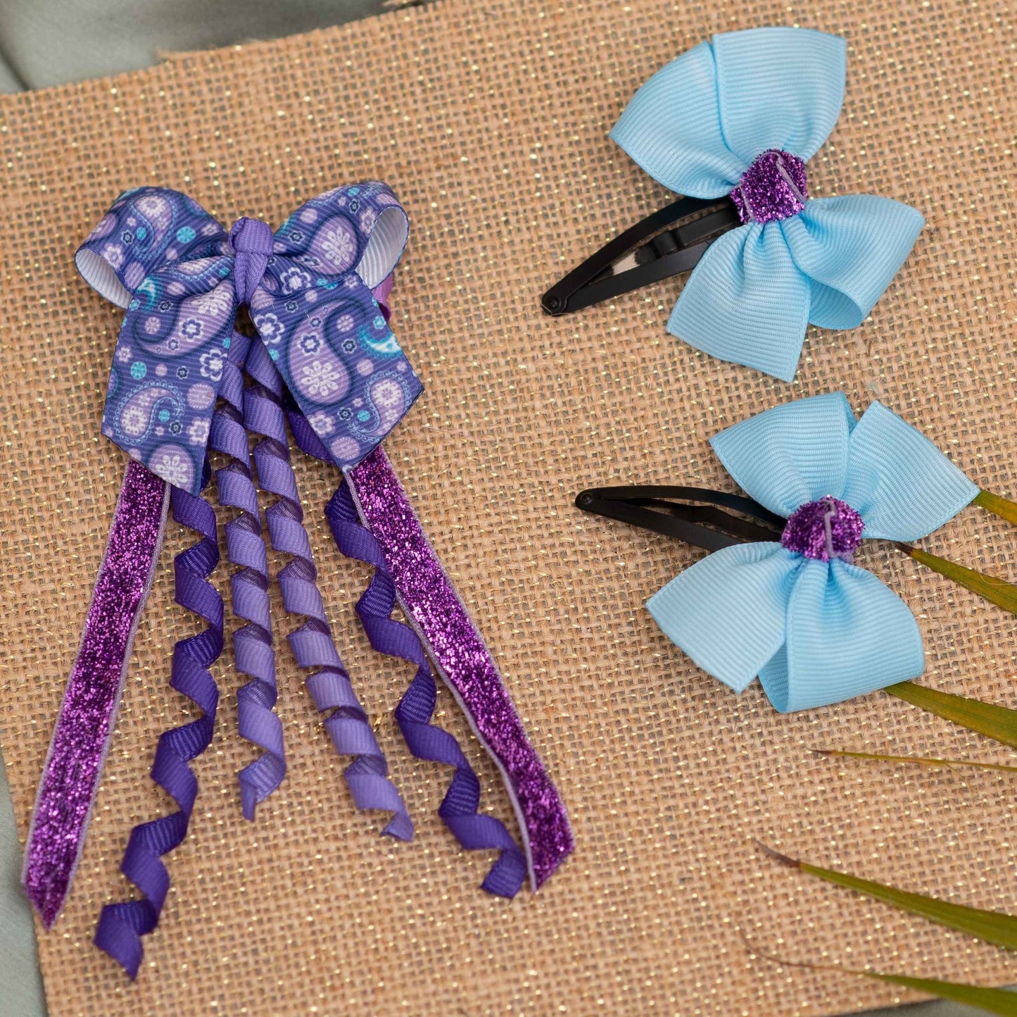 Combo: Cute dangler on alligator clip along with cute and fancy bow on tic-tac pins - Purple and Blue (Set of 1 pairs a, 1 single bow - 3 quantity)