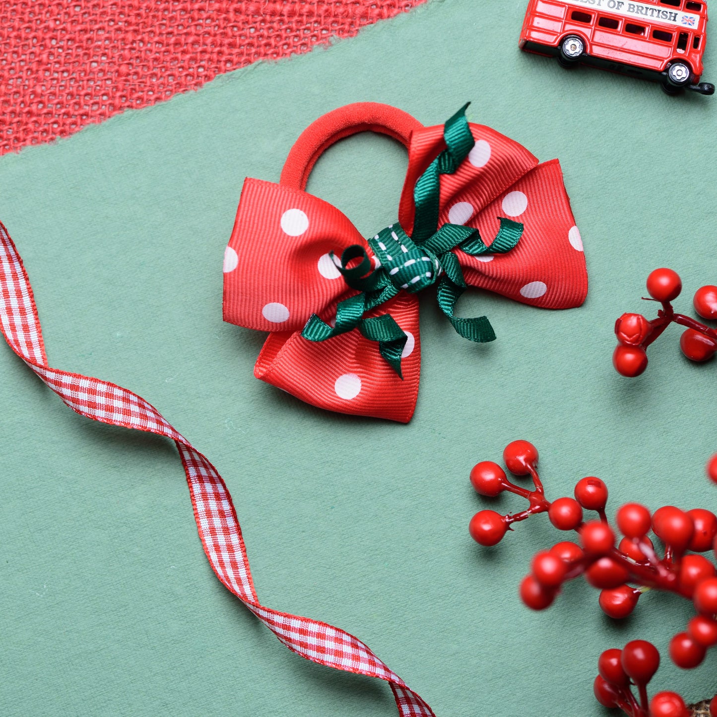 Christmas bow with Curly on rubber band -  Red and Green