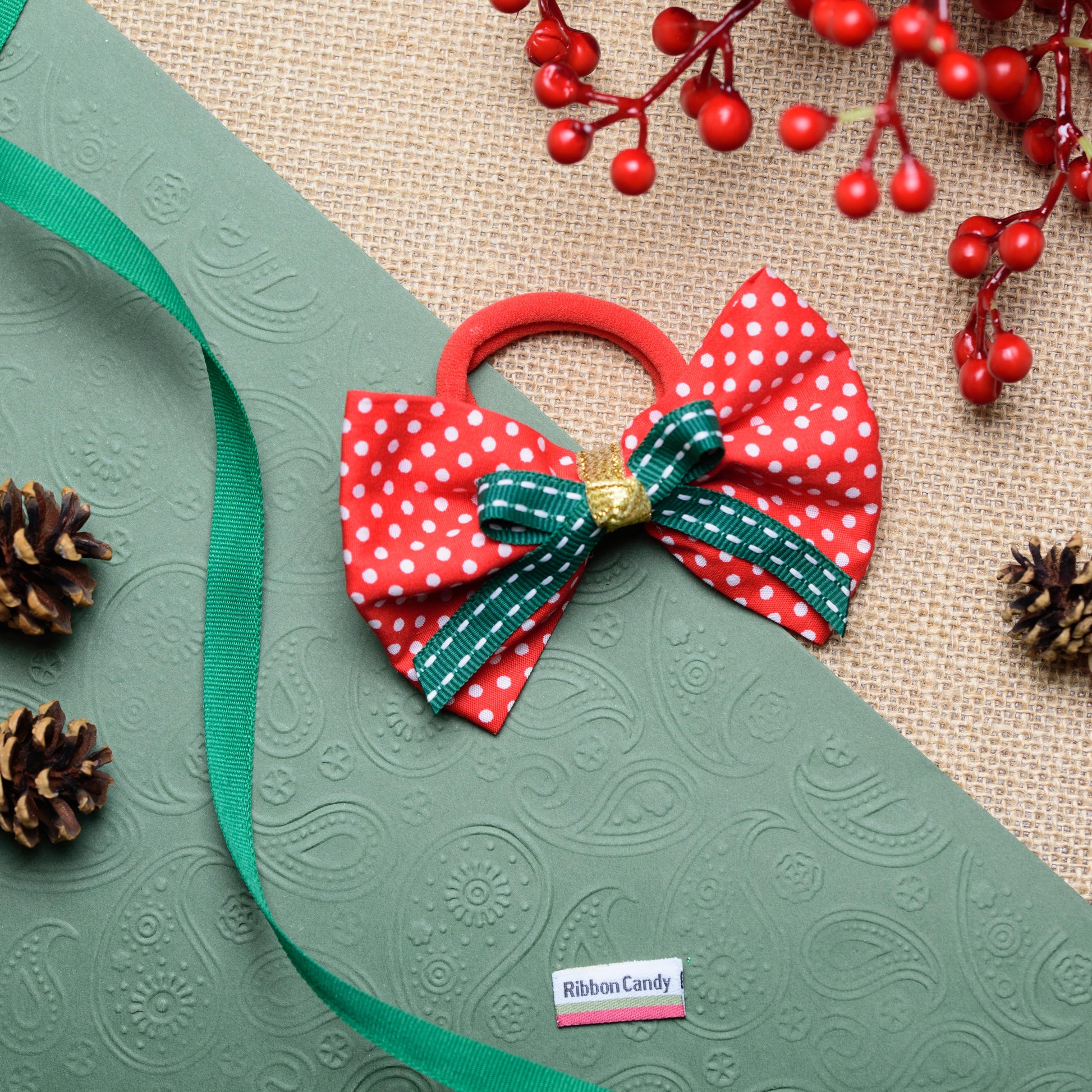 Polka Dotted Christmas (large) bow on rubber band - Red