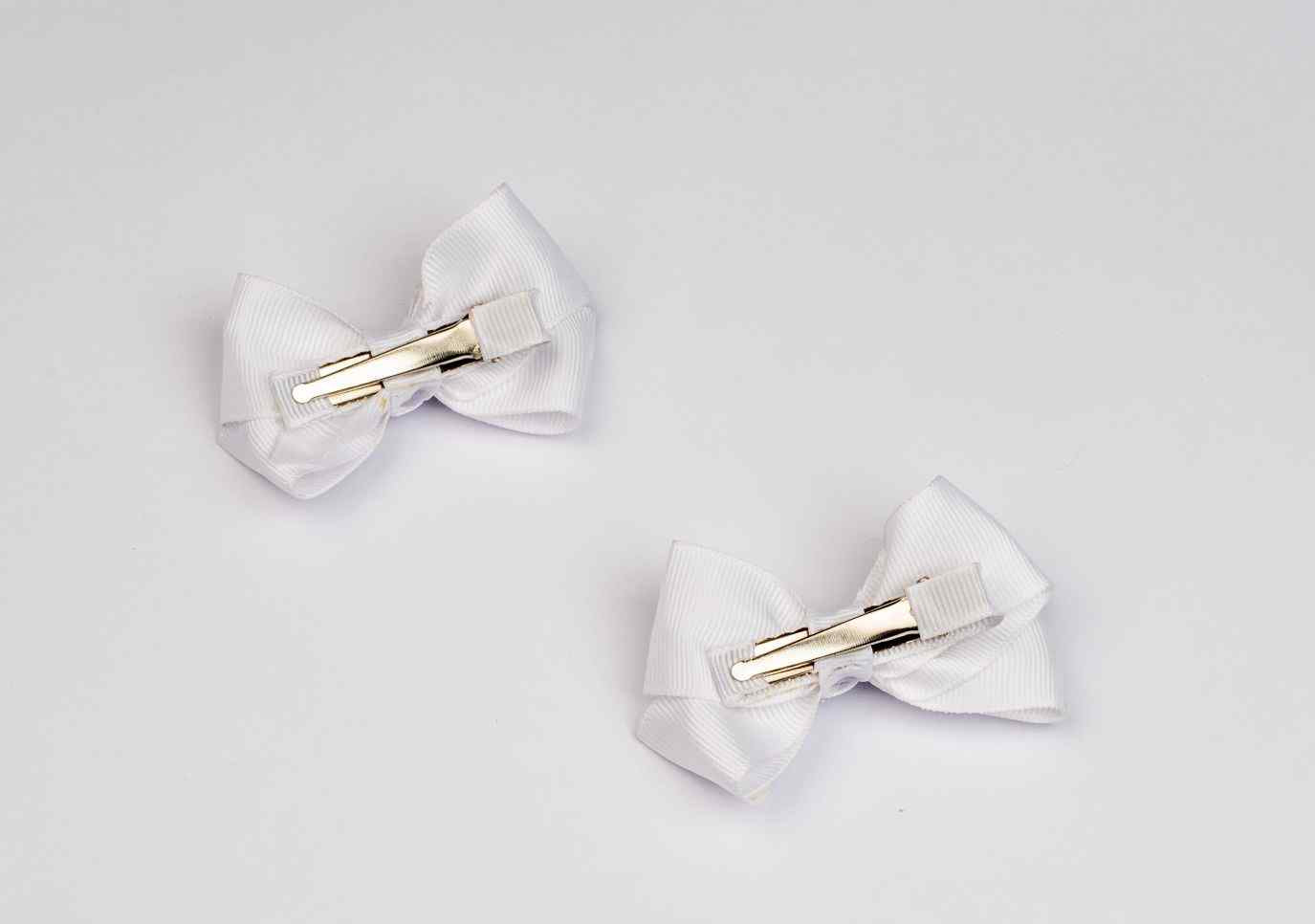 White festive boutique bows with Pearls